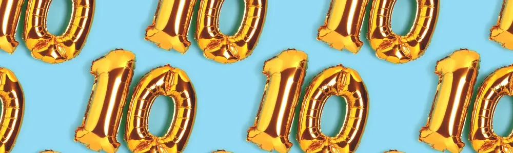 golden helium balloons showing 10s