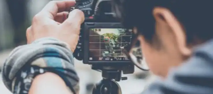 photographer lining up a camera angle  